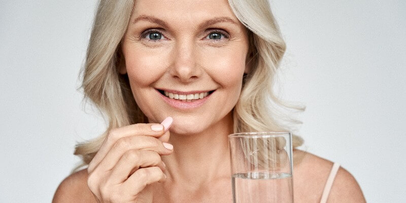 woman taking vitamins