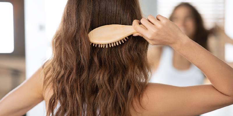 woman brushing hair